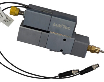 Dosificador volumétrico de pistón Lubtec serie 450 para aplicaciones industriales de alta precisión